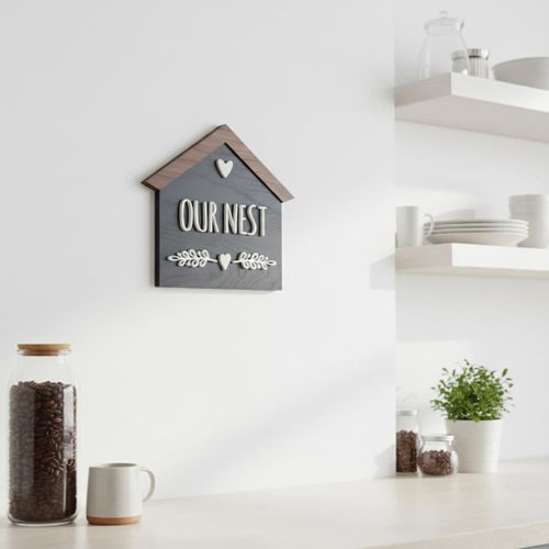 ديكور حائط خشبي مميز شكل بيت بعبارة Our Nest , تابلوه ديكور مجسم, بمقاس 32في28 سم مصنوع من خشب MDF أسباني فاخر بسمك 8 ملم ليضفي الي اي ركن من منزلك الجمال و الاناقة