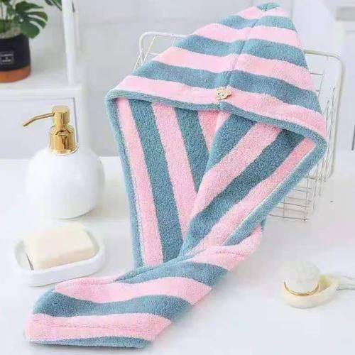 Hair drying bonnet with a button