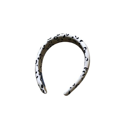 Hair clip, beige polka dot satin headband, a fashionable accessory that adds a touch of luxury to your look, designed for easy wear.