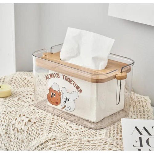 A rectangular acrylic tissue dispenser with a cute bear design, a removable bamboo lid, and a practical side scale for the home.