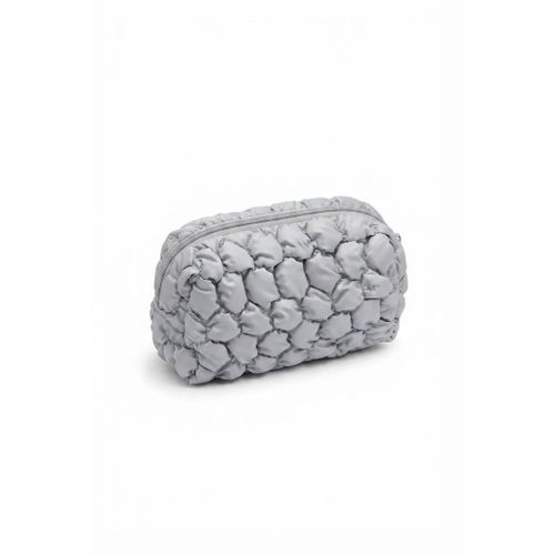 Padded makeup bag with a stylish quilted design and secure zipper closure. Ideal for organizing cosmetics, skincare products, accessories and personal essentials at home or while traveling.