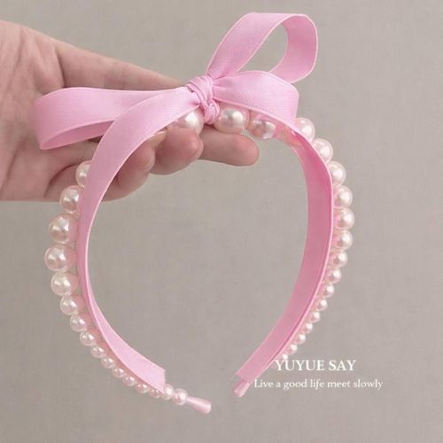 Pearl headband adorned with satin ribbon