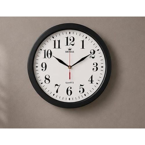 A classic round wall clock with an elegant plastic frame that adds a touch of beauty to any space and is suitable for hanging in living rooms, bedrooms, offices, and throughout the home.