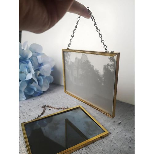 Rectangular Mirror - Imported gold-tone metal frame mirror adds sophistication to contemporary décor, beautifully reflecting light and enhancing elegance in hallways or bedrooms