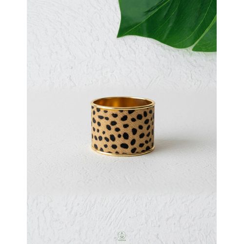 A wide solid cuff bracelet