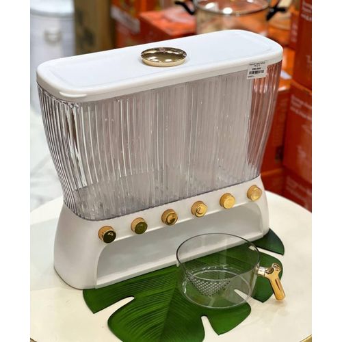 Golden legume dispenser, acrylic material, jumbo size, divided into 6 compartments, and also comes with a jug.