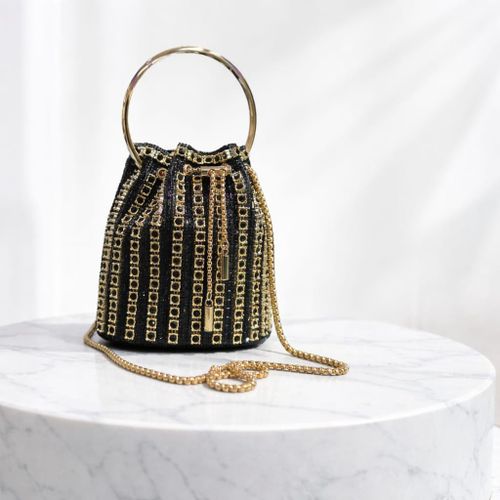A crystal handbag with a distinctive crystal design and delicate soft touches perfect for weddings and special occasions embodying elegance and charm for women
