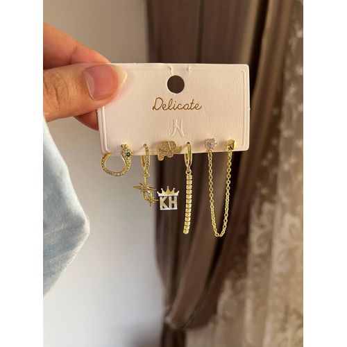 set of three pairs of gold-toned stainless steel stud earrings