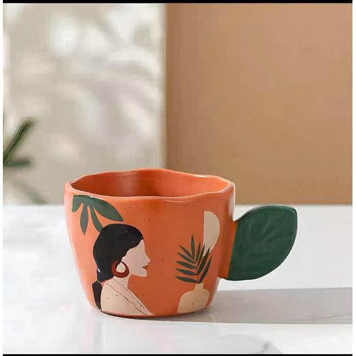 Elegant ceramic mug with abstractportrait art and a nature-inspired paper handle, perfect for relaxing coffee breaks, holds a generous amount of hot drinks, serves as a conversation starter in offices