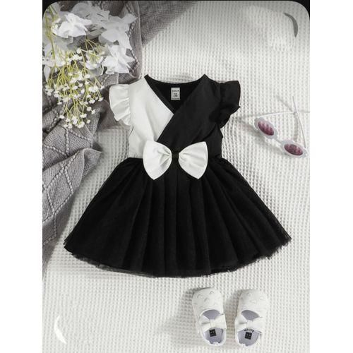 فستان صوف للأطفال باللونين الأبيض والأسود