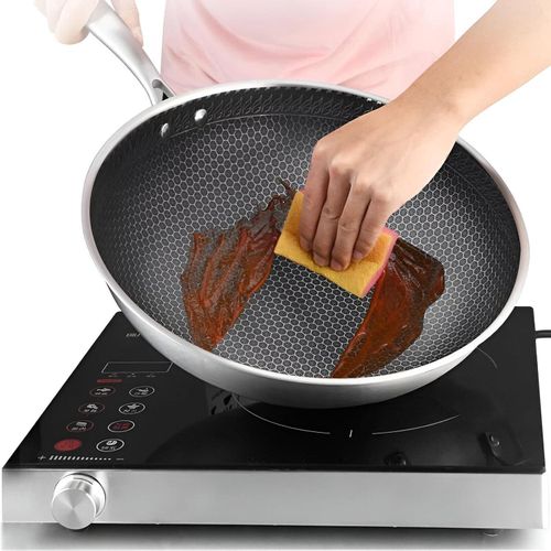 Honeycomb Frying Pan - Experience superior cooking with this uniquely designed skillet, featuring non-stick properties and a comfortable handle for all your culinary needs.