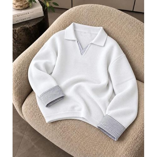 A distinctive pullover blouse with a unique texture.