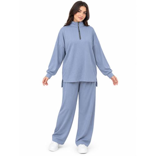 Women's casual two-piece set featuring a half-zip at the chest.