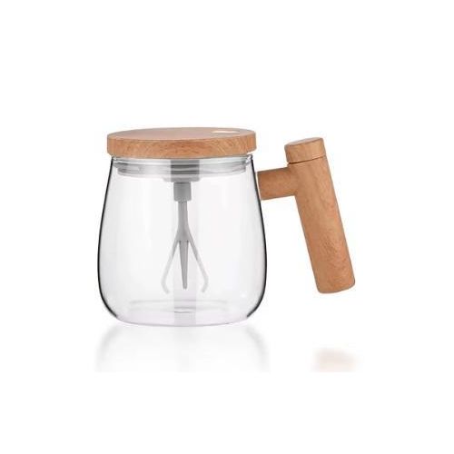 Electric self-stirring glass cup for coffee, milk and mixed drinks, 400ml capacity, operates on two batteries.