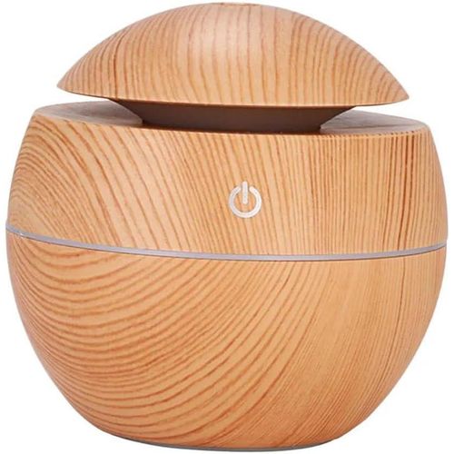 Aroma essential oil diffuser, round design, brings a touch of nature to your home.