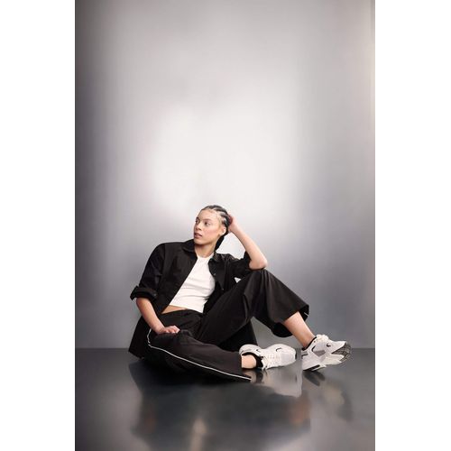 قميص كم طويل منسوج قصة مريحة