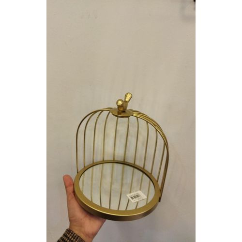 A unique, modern cake and cookie stand with a mirror and a stainless steel base, 1 tier