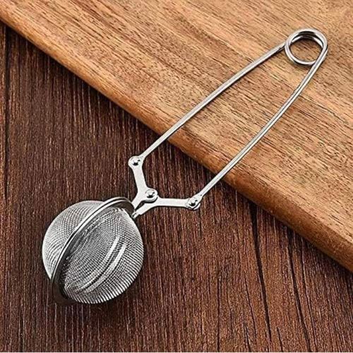 Snow Pearl stainless steel tea infuser with a mesh ball clip for filtering green tea leaves, the best tea strainer for the kitchen