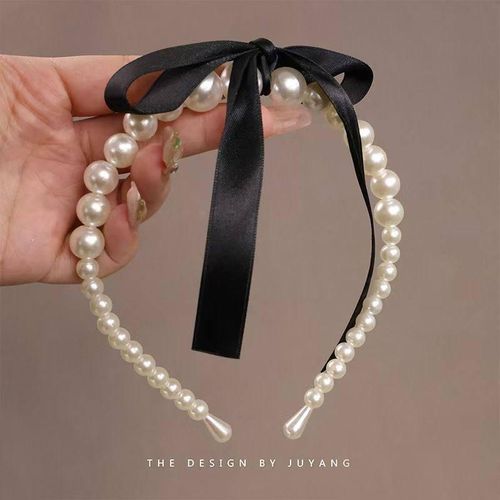 Pearl headband adorned with satin ribbon