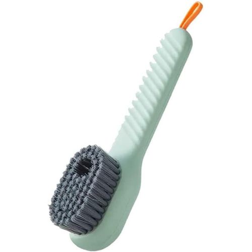 Portable cleaning brush for dispensing soap on clothes and shoes a versatile household cleaning brush with a comfortable grip and built-in detergent reservoir.