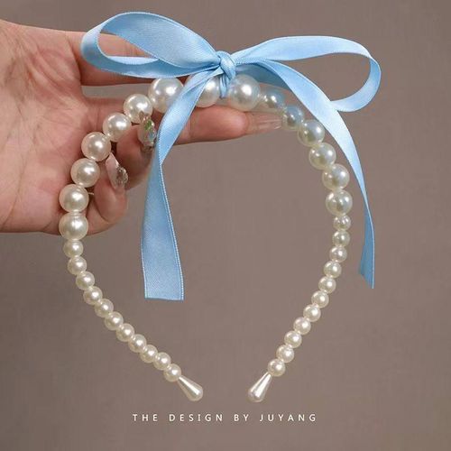Pearl headband adorned with satin ribbon