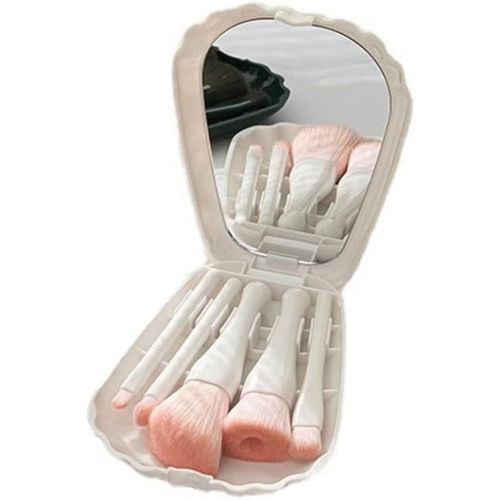 A makeup brush set in a shell-shaped case with a mirror for applying powder, lipstick, eyeshadow and cosmetics.