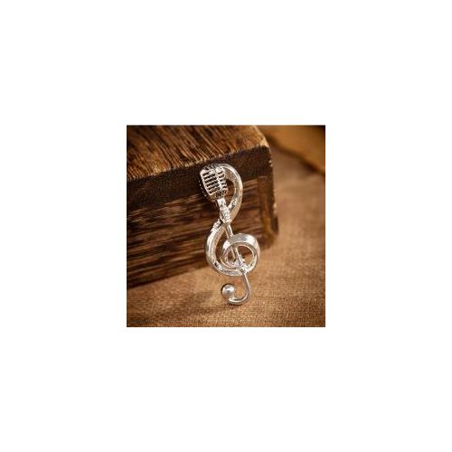 Microphone brooch and silver access key, a stylish accessory for a musical look.