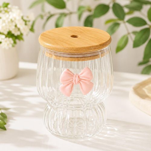 Iced coffee cup Glass with a wooden lid and straw Stylish and highly practical for daily use