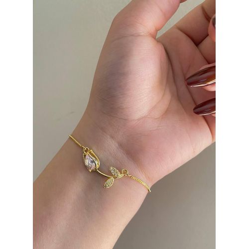 Gold stainless steel bracelet with a tulip design and zircon stones