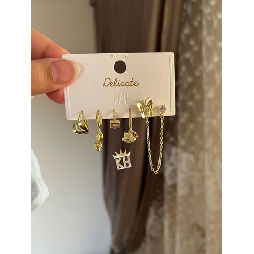 set of three pairs of gold-toned stainless steel stud earrings