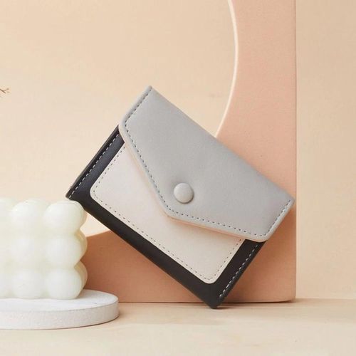 A stylish, lightweight leather wallet for women with multiple card slots and a zipper closure.