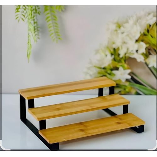 Spice Rack - A compact, space-saving spice rack crafted from sturdy wood and metal with a clever three-tier design that maximizes visibility, accessibility, and organization for all your jars.