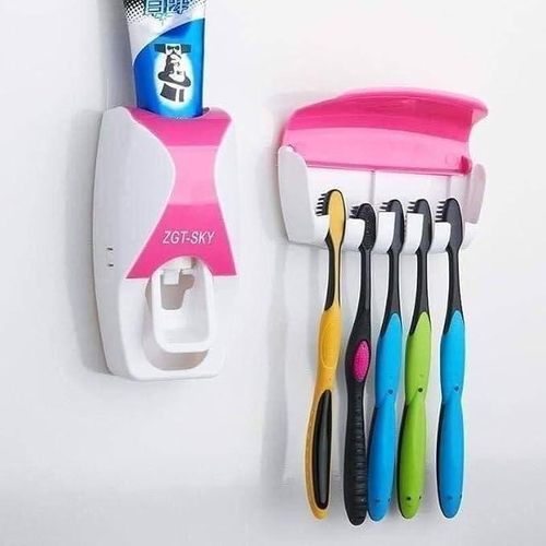 Toothbrush holder with automatic toothpaste dispenser