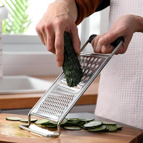 Grater and Chopper - A stainless steel kitchen tool for easily grating vegetables and cheese ideal for home cooks striving for perfection