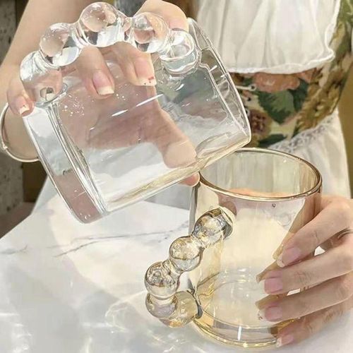 Glass mug with bubble handle
