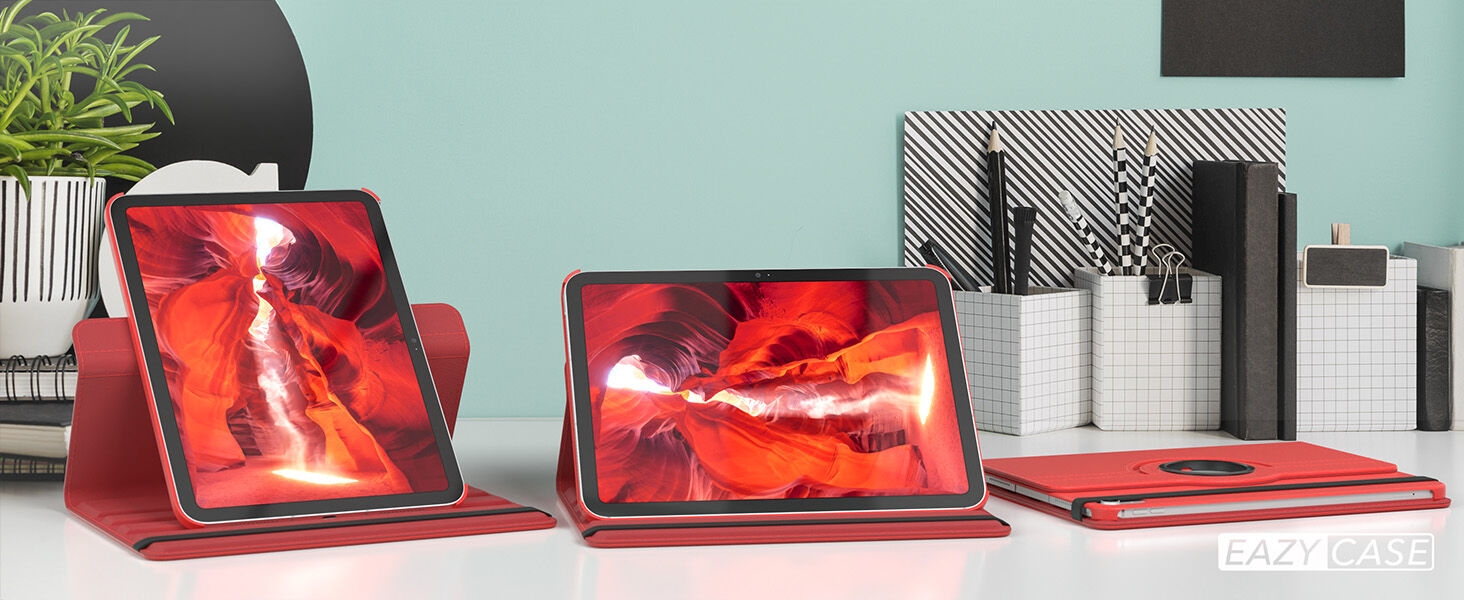une tablette rouge avec un étui rouge sur un bureau.