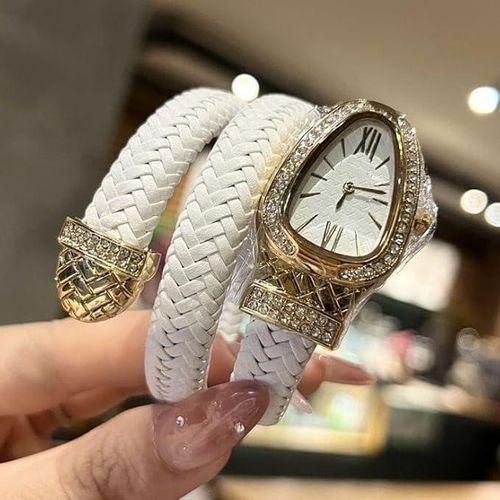 Elegant women's wristwatch made of leather with a snake skin design, classic luxury golden wristwatch for ladies, a special gift in white color