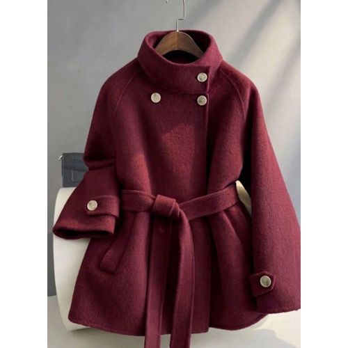 Distinctive trench coat made of high-quality material.