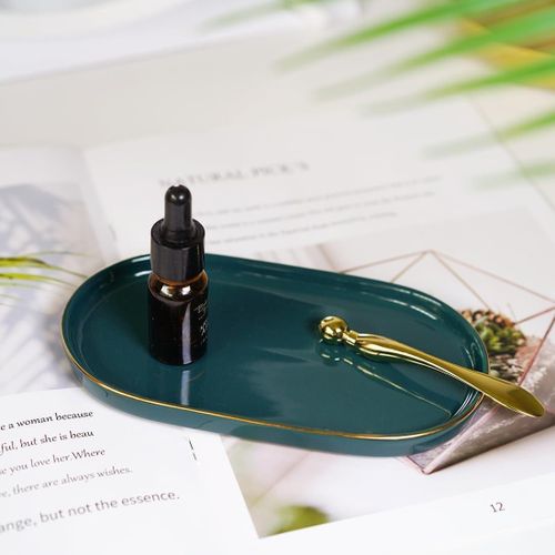 Decorative Tray- Luxurious ceramic organizer in emerald green and gold, designed with flowing oval lines to add a royal touch, ideal for keeping the elegance and elegance of travel organized and withi