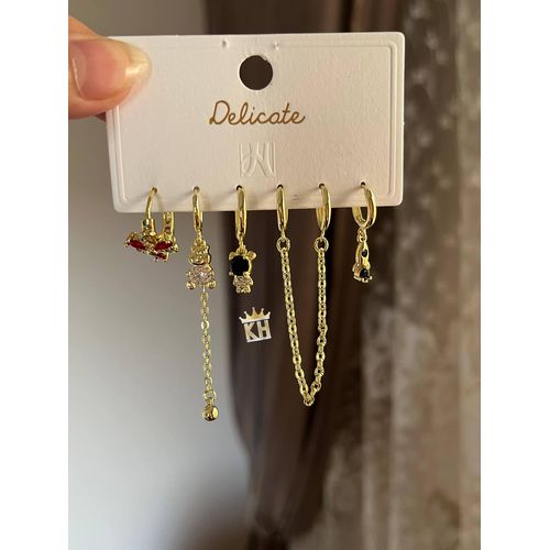 set of three pairs of gold-toned stainless steel stud earrings