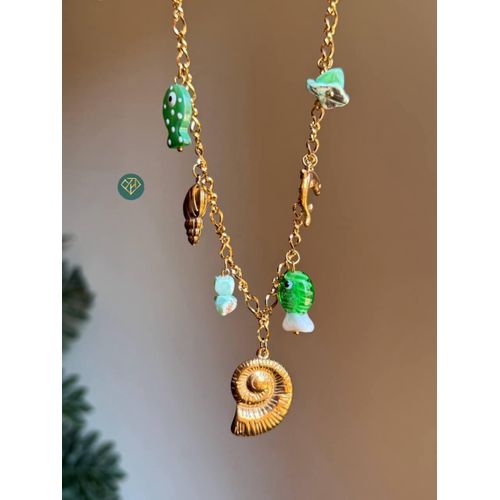 Trendy Green Beach Charm Necklace with Gold Spiral Shell & Ocean Elements