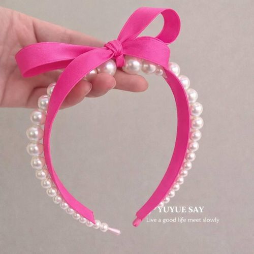Pearl headband adorned with satin ribbon