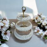 product_image_name-Generic-شيالة كحك دائرية هاند ميد من خرز لؤلؤ أوف وايت فاخر بلمعان ثابت – يد معدن ذهبي تصميم ورقة أنيق  قطعة راقية وفريدة للعرايس والأعياد-2