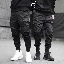 اشتري Hit Color Joggers Men Black Harem Pants Multi-pocket Ribbons Man Sweatpants Streetwear Casual Pants Elastic Waist Male Trors في مصر