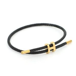 3Diamonds Women's bracelet, black braided rope with a gold H letter – stainless steel – elegant design – suitable for everyday wear
