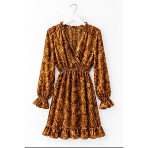 An elegant short wrap dress by Missguided featuring a V-neck, long sleeves, and a comfortable elasticated waist with stylish ruching. It showcases a snakeskin print in shades of brown and honey.