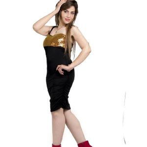 Women's short black dress with a gold sequin bodice.