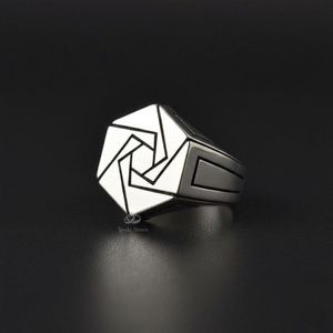 solid 925 sterling silver ring with a wavy, abstract design. 