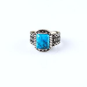 handmade sterling silver men's ring with a natural turquoise stone. 