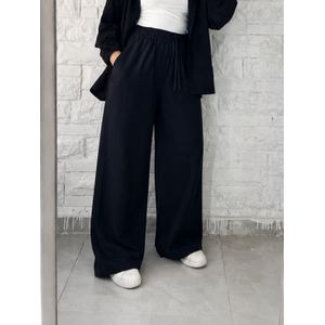 بنطلون حريمي واسع بخصر مطاطي ورباط أمامي